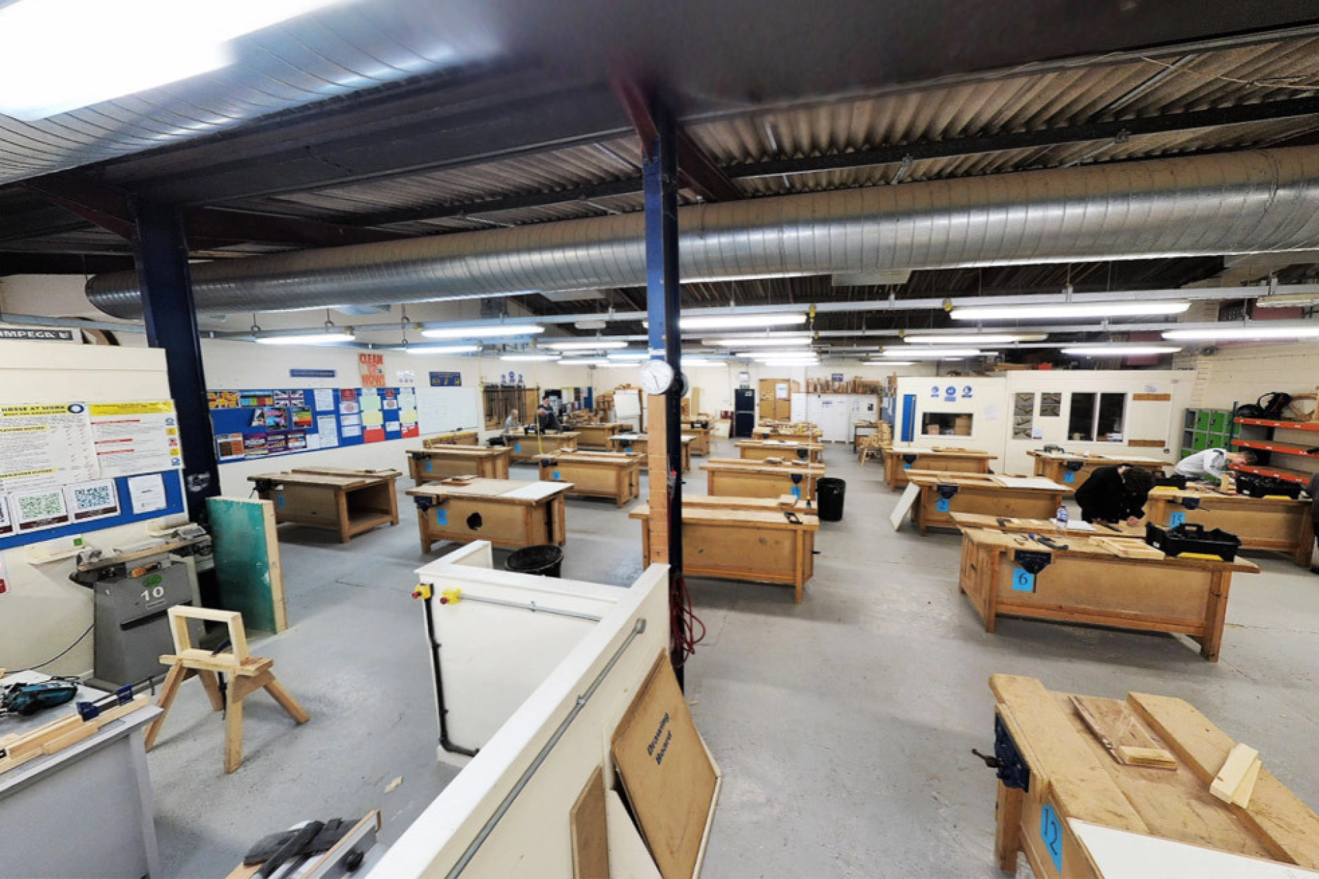 Fully equipped carpentry workshop with benches and equipment
