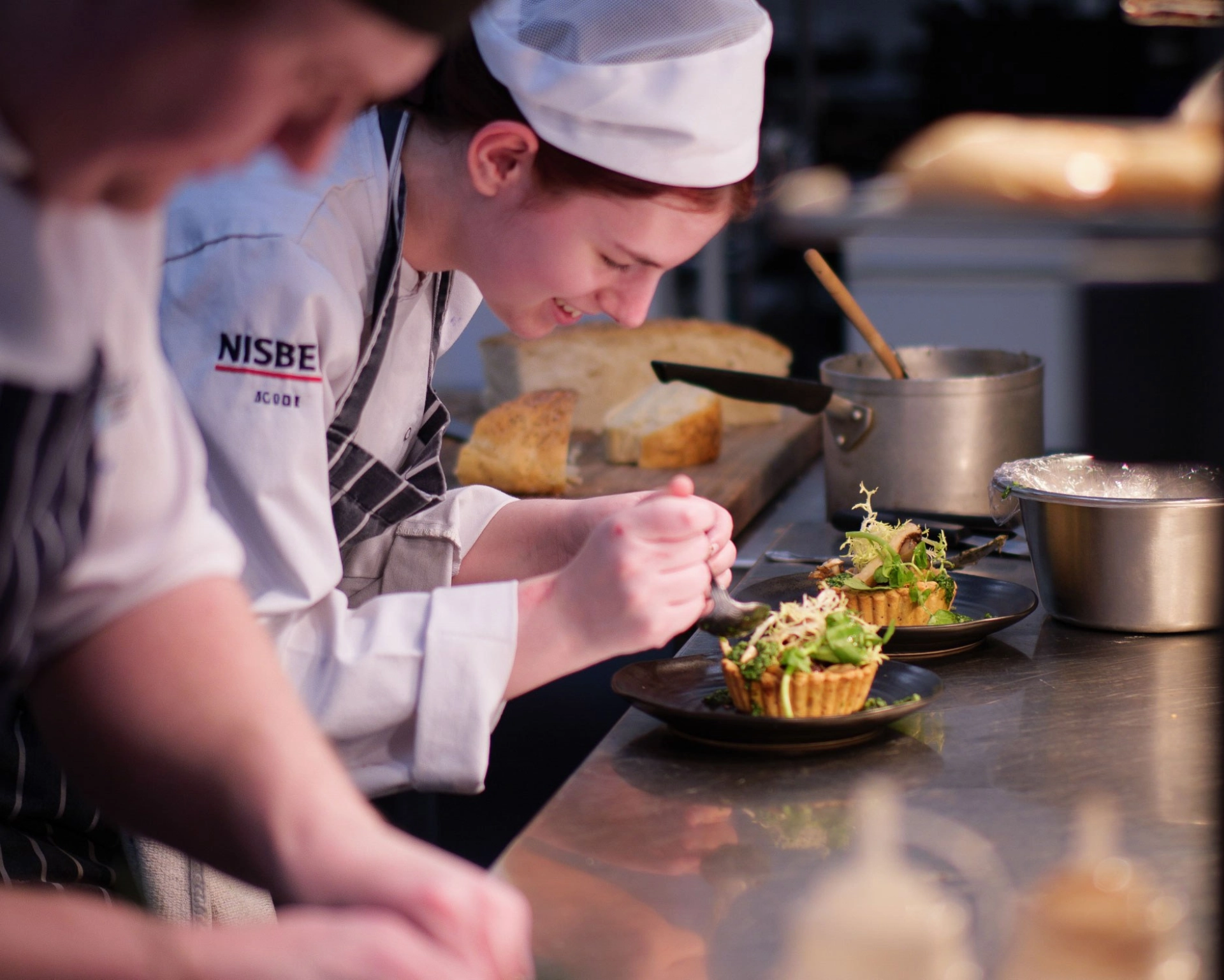 Student plating up food